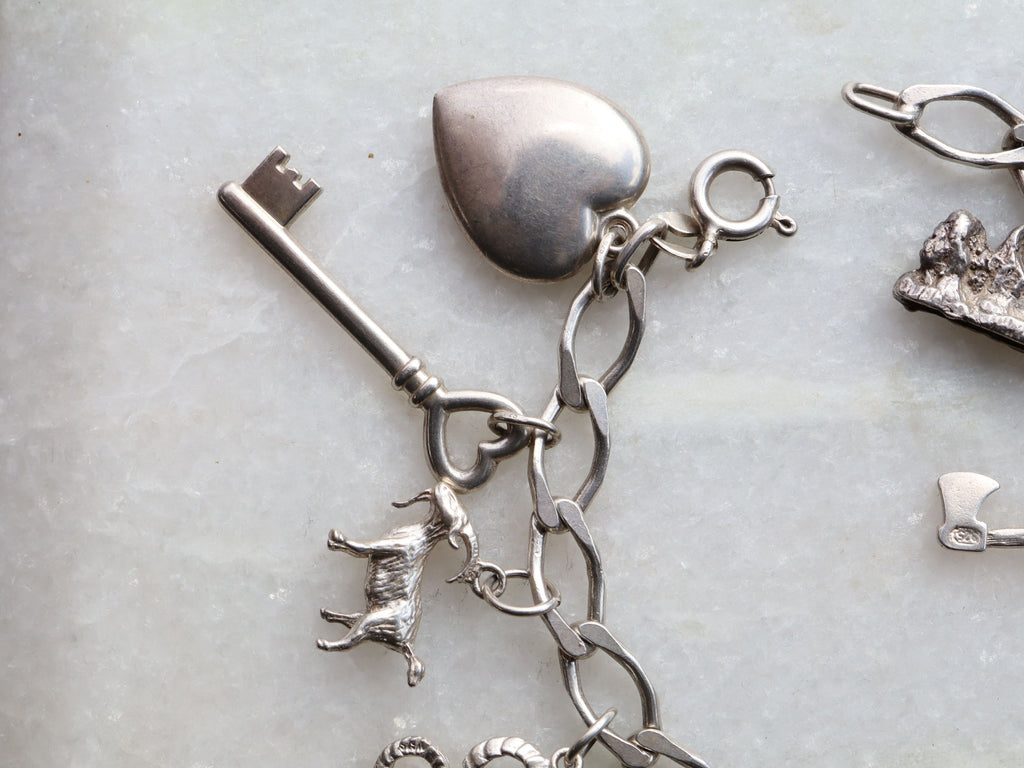 Sterling Silver Charm Bracelet With 15 Charms