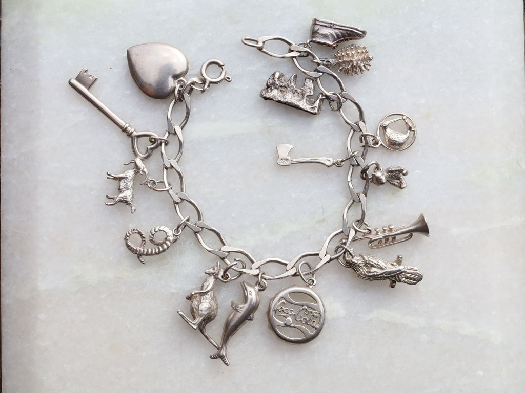 Sterling Silver Charm Bracelet With 15 Charms
