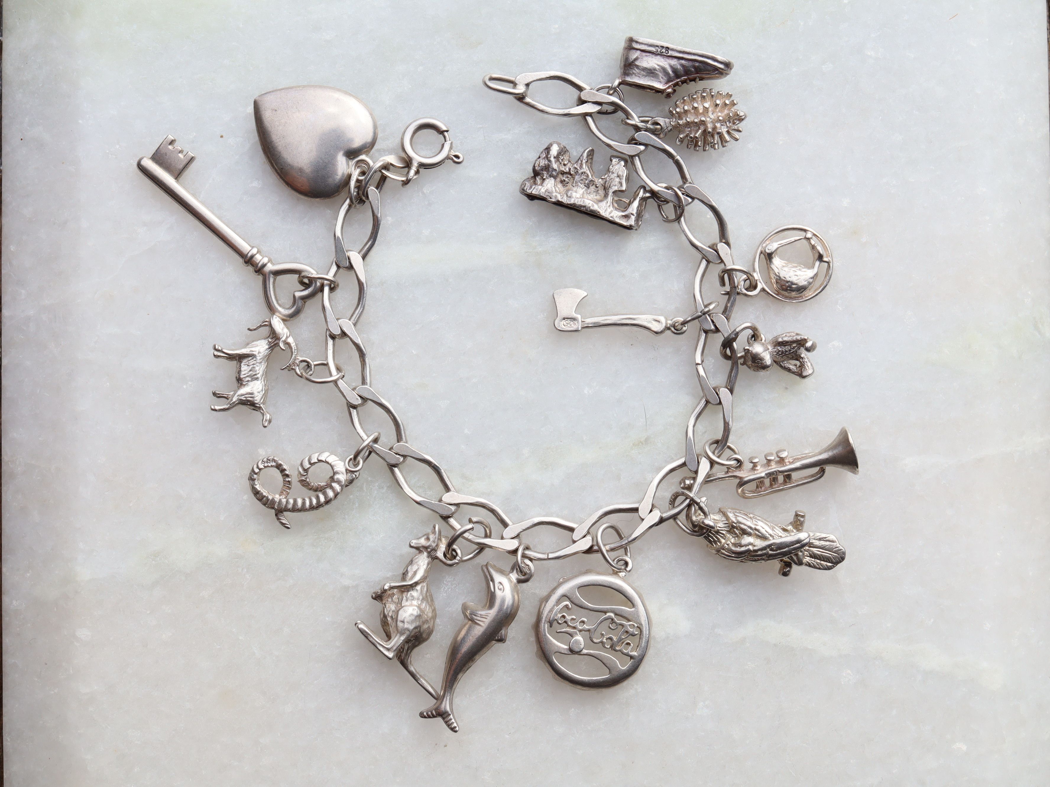 Sterling Silver Charm Bracelet With 15 Charms