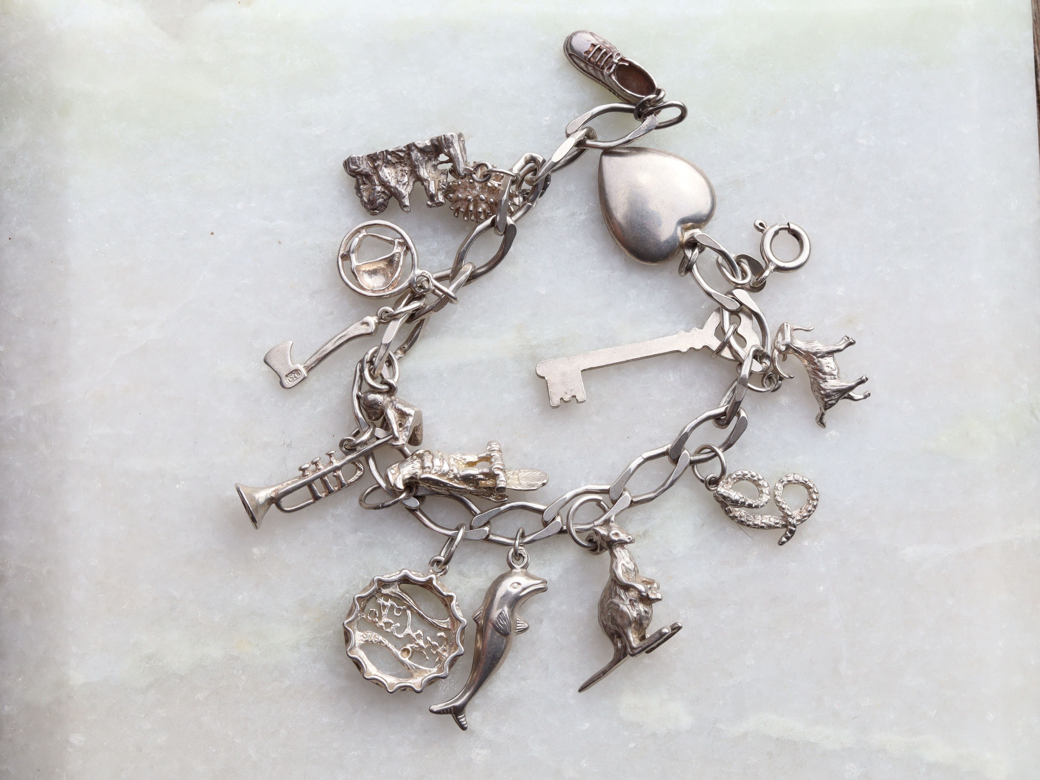 Sterling Silver Charm Bracelet With 15 Charms