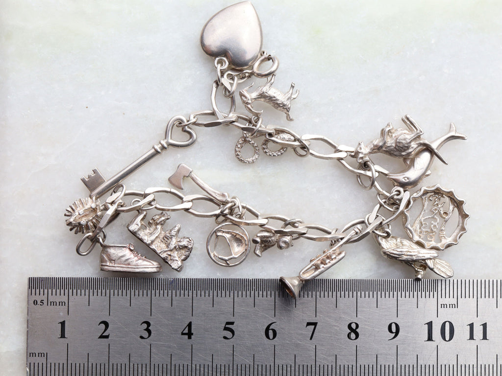 Sterling Silver Charm Bracelet With 15 Charms