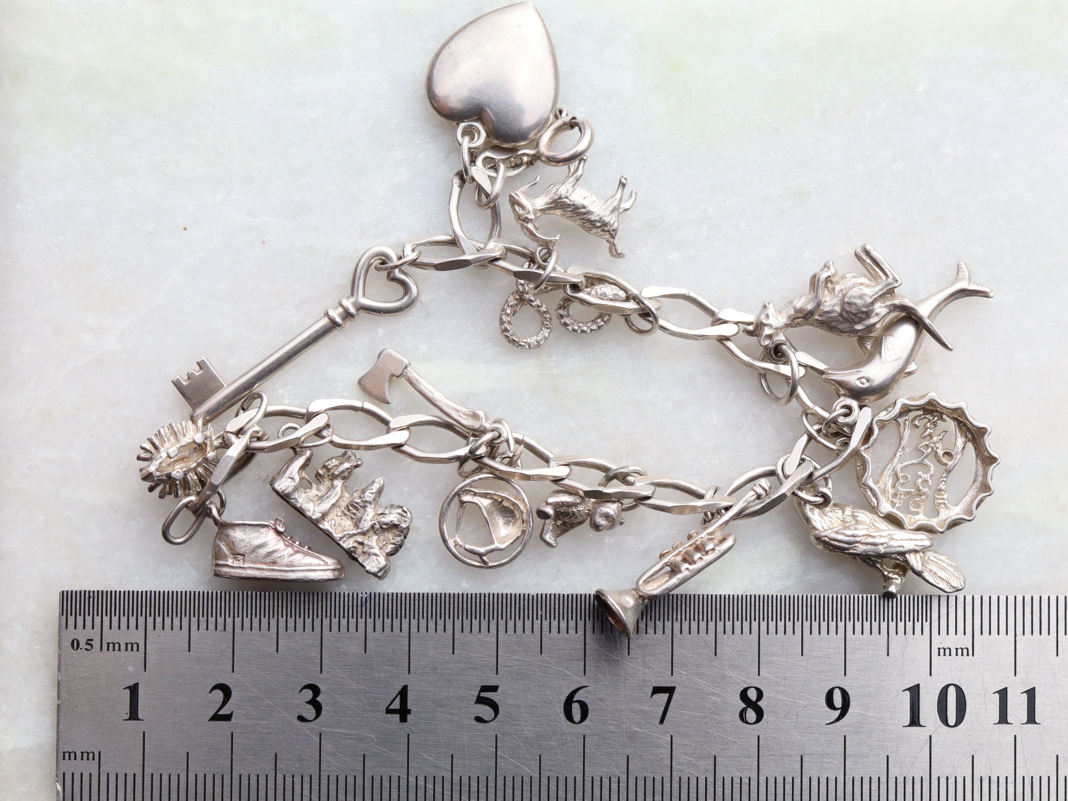 Sterling Silver Charm Bracelet With 15 Charms