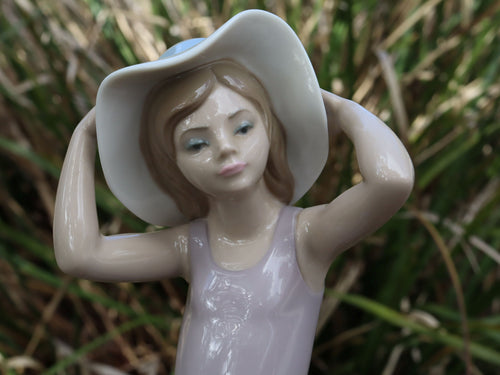 Lladro "Coy Girl with Straw Hat" #5011
