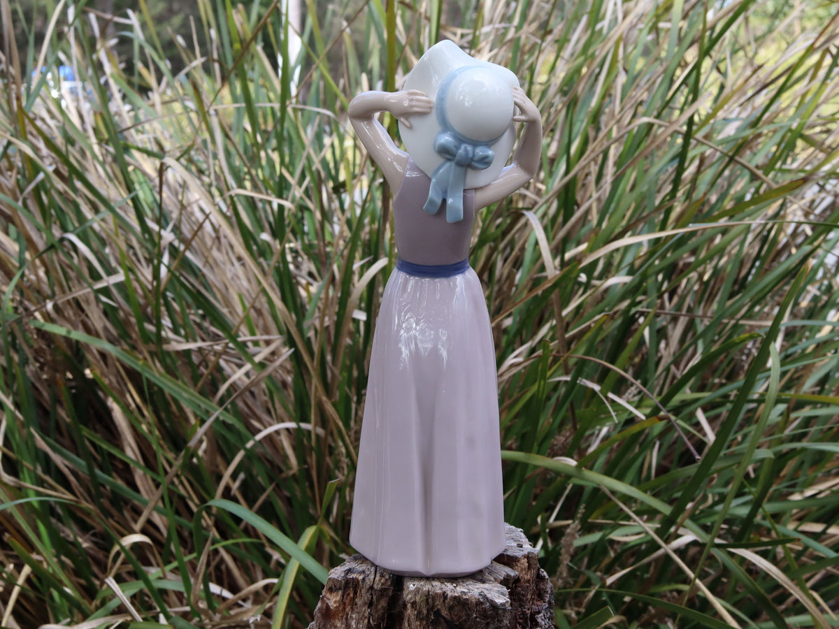 Lladro "Coy Girl with Straw Hat" #5011